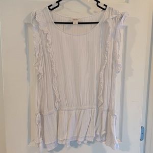 Beautiful white sleeveless top with rose gold embellishments. Size Large.